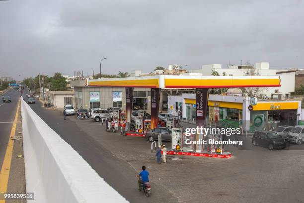 Shell Pakistan Ltd. Gas station stands in Karachi, Pakistan, on Monday, July 9, 2018. The Pakistan economy is in distress. How else to describe an...