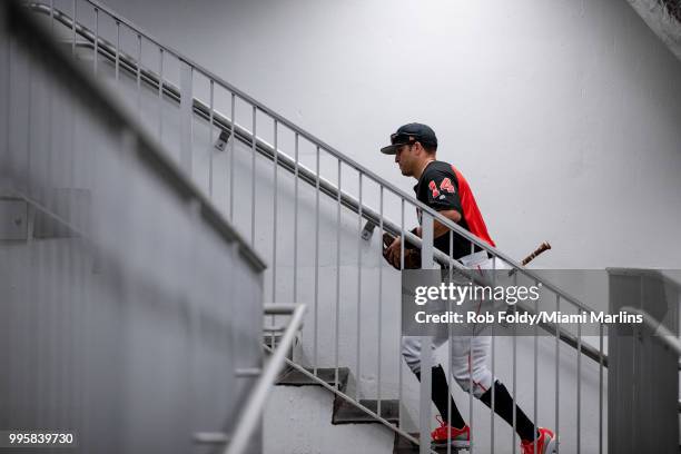 Martin Prado of the Miami Marlins walks up the stairs to the clubhouse after batting practice before the game against the Milwaukee Brewers at...