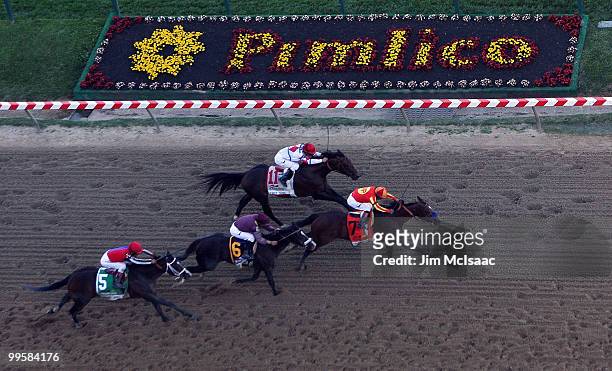 Lookin At Lucky , ridden by Martin Garcia, holds off First Dude, ridden by Ramon Dominguez, Jackson Bend , ridden by Mike Smith, and Yawanna Twist,...