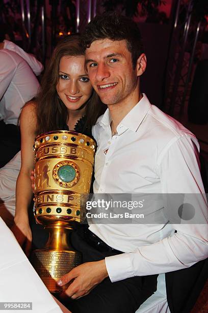 Thomas Mueller and his wife Lisa attend the Bayern Muenchen Champions Party after the DFB Cup Final match against Werder Bremen at DeutscheTelekom...