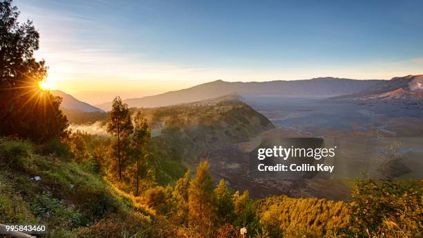 sunrise over tengger caldera - tengger stock pictures, royalty-free photos & images