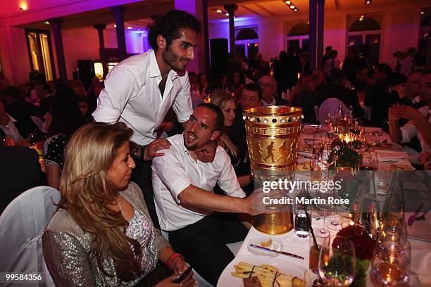 Hamit Altintop talks to Franck Ribery during the Bayern Muenchen Champions Party after the DFB Cup Final match against Werder Bremen at...