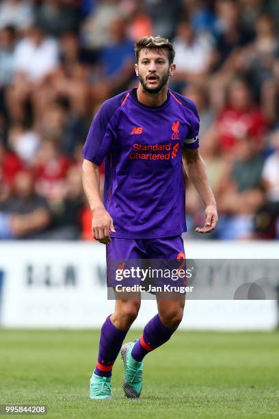 Adam Lallana of Liverpool in action during the Pre-Season Friendly match between Tranmere Rovers and Liverpool at Prenton Park on July 11, 2018 in...