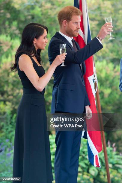 Prince Harry, Duke of Sussex and Meghan, Duchess of Sussex attend a reception at Glencairn, the residence of Robin Barnett, the British Ambassador to...