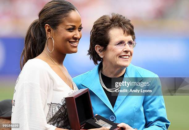 Billie Jean King is presented her Beacon Award by Laila Ali before the Gillette Civil Rights Game between the Cincinnati Reds and the St. Louis...