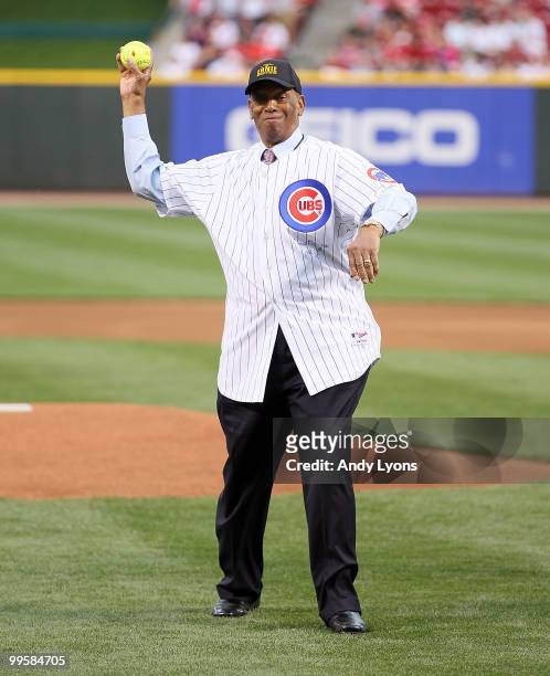 Ernie Banks throws out the first pitch before the Gillette Civil Rights Game between the Cincinnati Reds and the St. Louis Cardinals at Great...