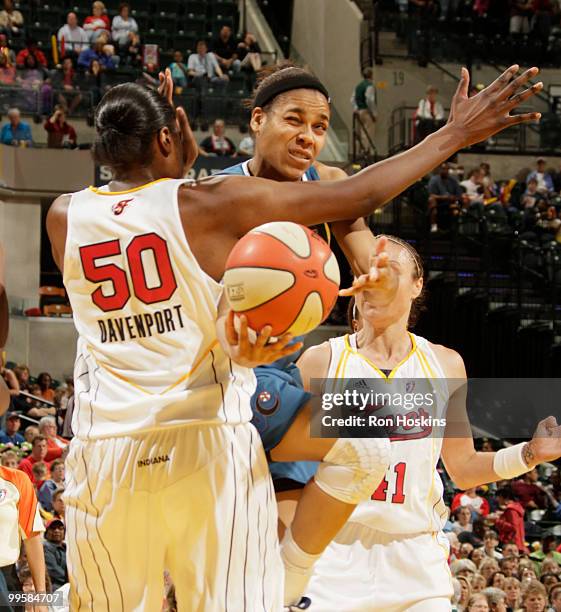 Lindsey Harding of the Washington Mystics battles Jessica Davenport of the Indiana Fever at Conseco Fieldhouse on May 15, 2010 in Indianapolis,...