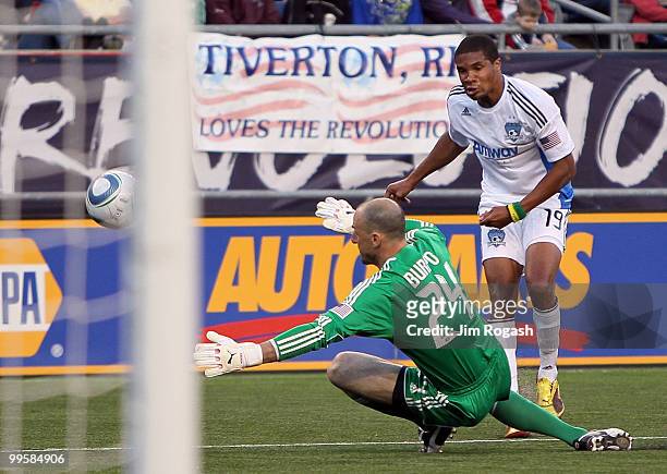 Ryan Johnson of the San Jose Earthquakes shoots on wide net against Goalie Preston Burpo of the New England Revolution at Gillette Stadium on May 15,...