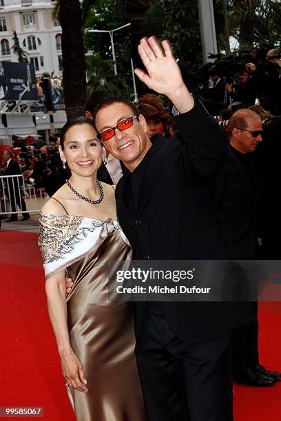 Gladys Portugues and Jean Claude Van Damme attend the 'You Will Meet A Tall Dark Stranger' premiere at the Palais des Festivals during the 63rd...