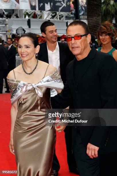 Gladys Portugues and Jean Claude Van Damme attend the 'You Will Meet A Tall Dark Stranger' premiere at the Palais des Festivals during the 63rd...
