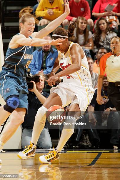 Katie Smith of the Washington Mystics battles Tamika Catchings of the Indiana Fever at Conseco Fieldhouse on May 15, 2010 in Indianapolis, Indiana....