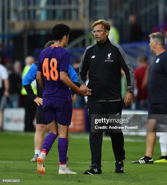 Jurgen Klopp manager of Liverpool with Curtis Jones at the end of the pre-season friendly match between Tranmere Rovers and Liverpool at Prenton Park...