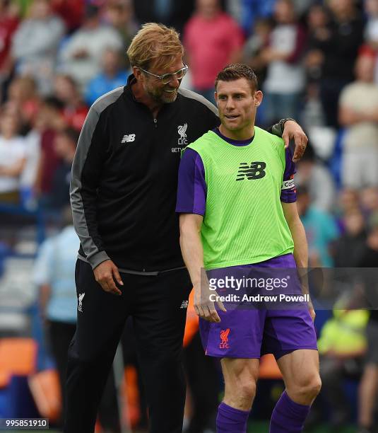 Jurgen Klopp manager of Liverpool with James Milner at the end of the pre-season friendly match between Tranmere Rovers and Liverpool at Prenton Park...