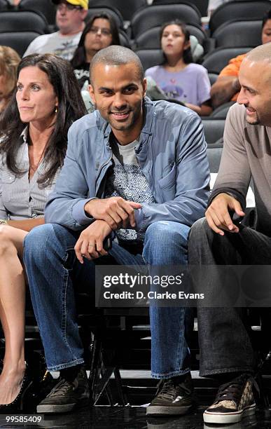 Tony Parker of the San Antonio Spurs enjoys the game between the San Antonio Silver Stars and the Atlanta Dream during the game at AT&T Center on May...