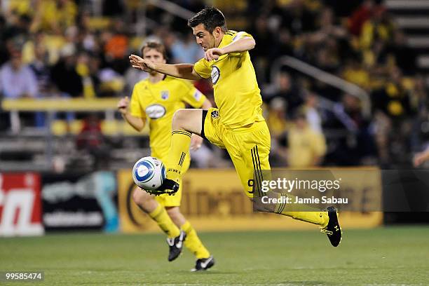 Jason Garey of the Columbus Crew leaps to take control of the ball against Chivas USA on May 15, 2010 at Crew Stadium in Columbus, Ohio.