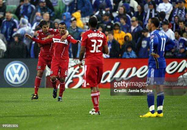 Julio Martinez of the Chicago Fire is congratulated by Baggio Husidic after scoring during the game against the Kansas City Wizards on May 15, 2010...