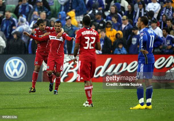 Julio Martinez of the Chicago Fire is congratulated by Baggio Husidic after scoring during the game against the Kansas City Wizards on May 15, 2010...