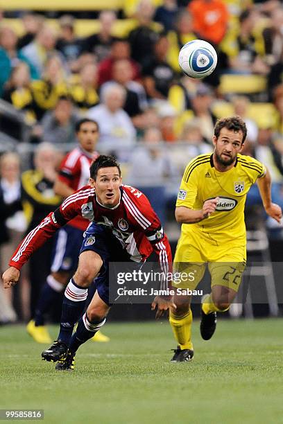 Sacha Kljestan of Chivas USA and Adam Moffat of the Columbus Crew chase down a loose ball on May 15, 2010 at Crew Stadium in Columbus, Ohio.