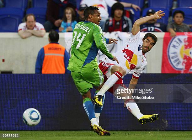 Tyrone Marshall of the Seattle Sounders FC knocks Juan Pablo Angel of the New York Red Bulls to the turf on May 15, 2010 at Red Bull Arena in...