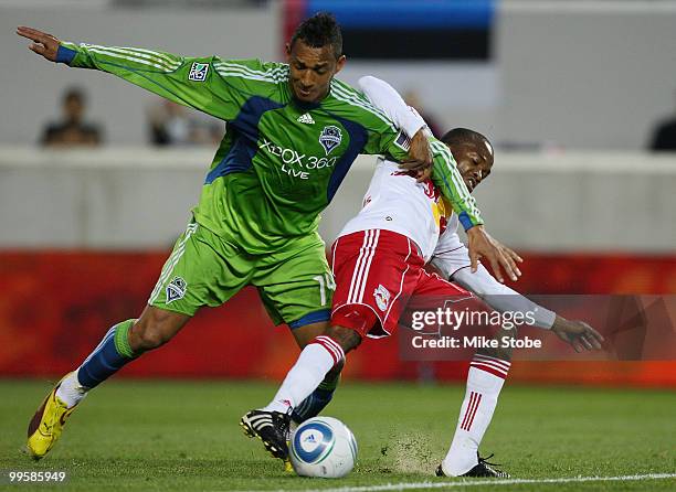 Tyrone Marshall of the Seattle Sounders FC knocks Dane Richards of the New York Red Bulls off the ball on May 15, 2010 at Red Bull Arena in Harrison,...