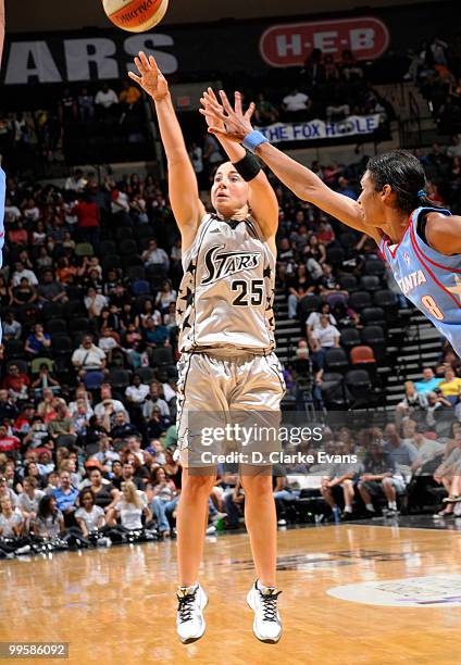 Becky Hammon of the San Antonio Silver Stars shoots against the Atlanta Dream during the game at AT&T Center on May 15, 2010 in San Antonio, Texas....