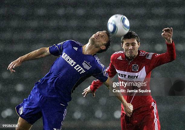 Jack Jewsbury of the Kansas City Wizards battles Peter Lowry of the Chicago Fire for a head ball during the game on May 15, 2010 at Community America...