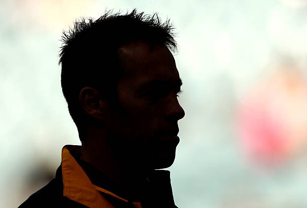 Alastair Clarkson coach of the Hawks watches his team warm up during the round eight AFL match between the Richmond Tigers and the Hawthorn Hawks at...