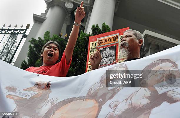 Resigned pro-democracy lawmaker "Long Hair" Leung Kwok-hung of the League of Social Democrats, the radical faction in the pro-democracy camp, shouts...