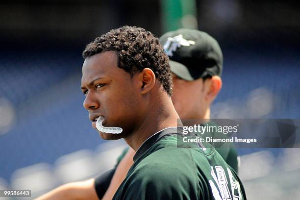 Shortstop Hanley Ramirez of the Florida Marlins chews on his mouthpiece while warming up prior to a game on May 9, 2010 against the Washington...