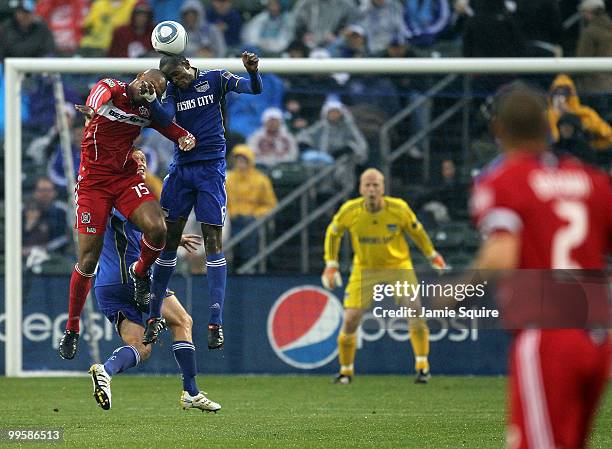 Collins John of the Chicago Fire battles Pablo Escobar of the Kansas City Wizards for a header during the game on May 15, 2010 at Community America...