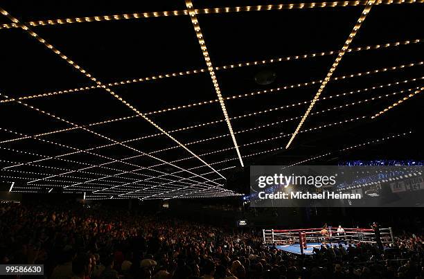 Amir Khan of Great Britain and Paulie Malignaggi exchange blows during the WBA light welterweight title fight at Madison Square Garden on May 15,...