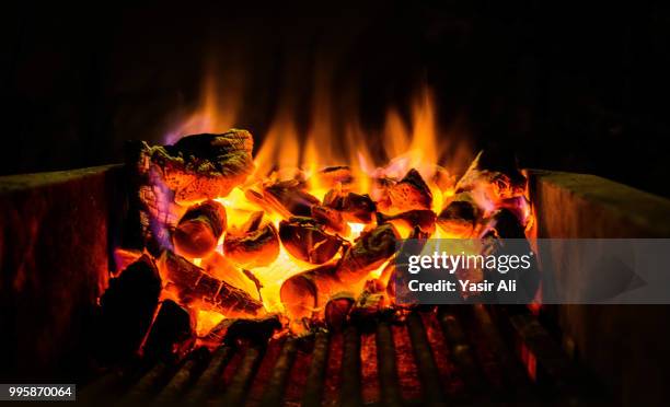 on fire! - burning coal stock pictures, royalty-free photos & images