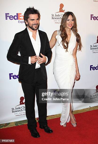 Juanes and Karen Martinez arrive at the 8th annual FedEx and St. Jude Angels and Stars Gala at the InterContinental Hotel on May 15, 2010 in Miami,...