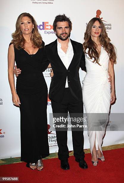 Daisy Fuentes, Juanes and Karen Martinez arrive at the 8th annual FedEx and St. Jude Angels and Stars Gala at the InterContinental Hotel on May 15,...