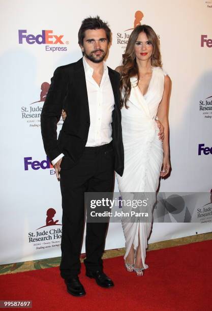 Juanes and Karen Martinez arrive at the 8th annual FedEx and St. Jude Angels and Stars Gala at the InterContinental Hotel on May 15, 2010 in Miami,...