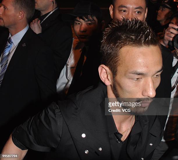 Japanese former football star Hidetoshi Nakata attends the Dior Cruise 2011 fashion show on May 15, 2010 in Shanghai, China.
