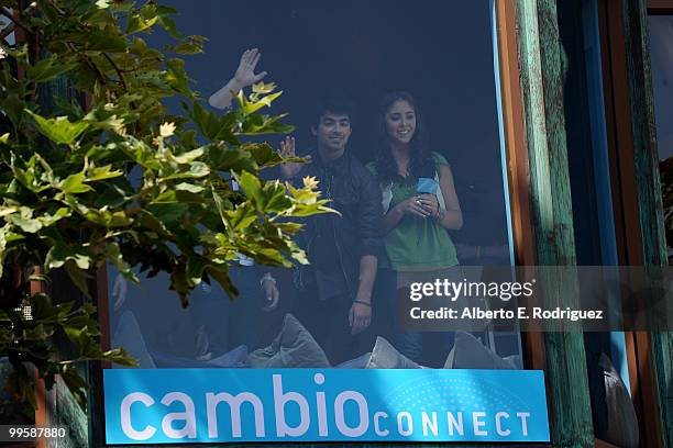 Musician Joe Jonas waves to fans at the Grove to kick off the summer concert series on May 15, 2010 in Los Angeles, California.