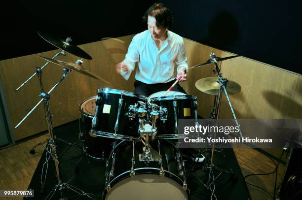 senior man playing drum set on recording studio - chofu stock pictures, royalty-free photos & images