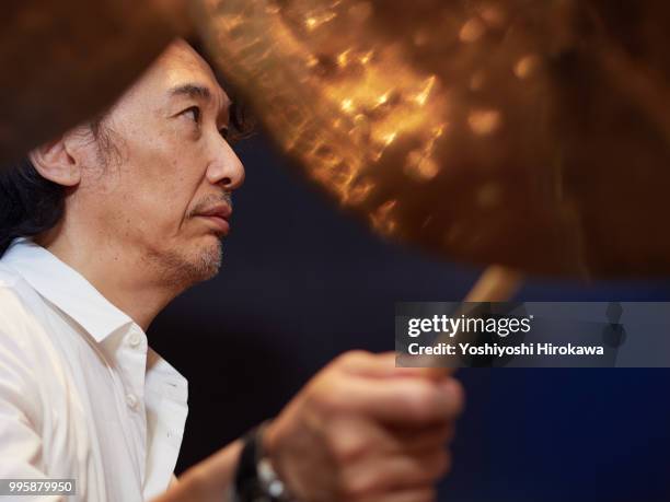 senior man playing drum set on recording studio - chofu stock pictures, royalty-free photos & images