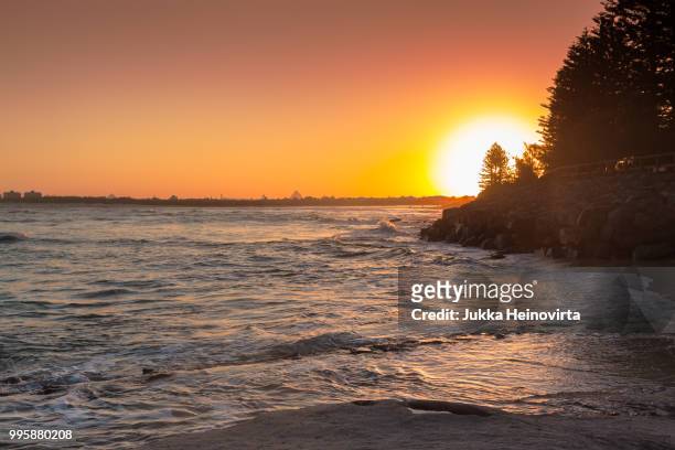 caloundra beach sunset - caloundra stock pictures, royalty-free photos & images