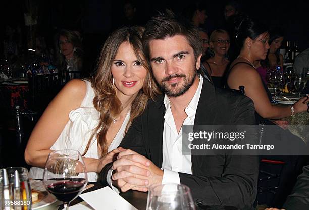 Musician Juanes and his wife Karen Martinez attend the 8th annual FedEx and St. Jude Angels and Stars Gala at InterContinental Hotel on May 15, 2010...