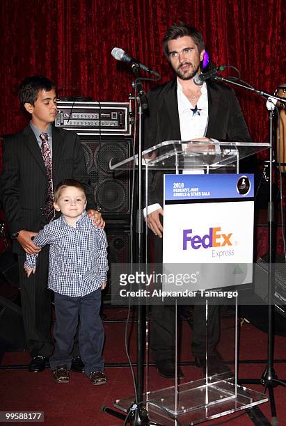 Juanes accepts an award the 8th annual FedEx and St. Jude Angels and Stars Gala at InterContinental Hotel on May 15, 2010 in Miami, Florida.