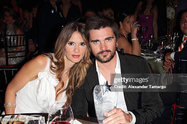 Musician Juanes and his wife Karen Martinez attend the 8th annual FedEx and St. Jude Angels and Stars Gala at InterContinental Hotel on May 15, 2010...