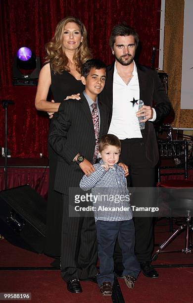 Daisy Fuentes and Juanes pose with St. Jude children the 8th annual FedEx and St. Jude Angels and Stars Gala at InterContinental Hotel on May 15,...