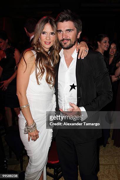 Musician Juanes and his wife Karen Martinez attend the 8th annual FedEx and St. Jude Angels and Stars Gala at InterContinental Hotel on May 15, 2010...