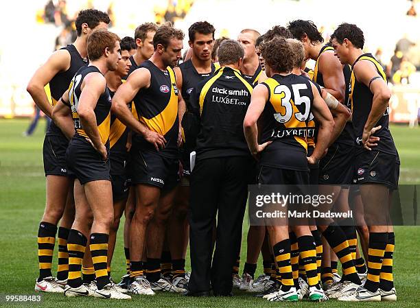 Damien Hardwick coach of the Tigers addresses his players after their narrow defeat in the round eight AFL match between the Richmond Tigers and the...