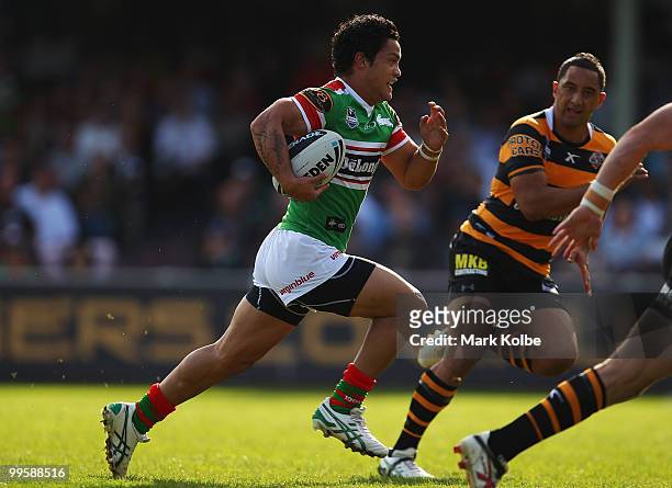 Issac Luke of the Rabbitohs makes a break during the round ten NRL match between the Wests Tigers and the South Sydney Rabbitohs at Sydney Cricket...
