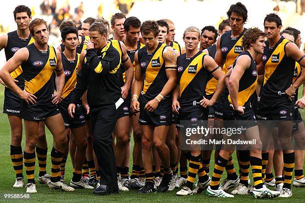 Damien Hardwick coach of the Tigers addresses his players after their narrow defeat in the round eight AFL match between the Richmond Tigers and the...