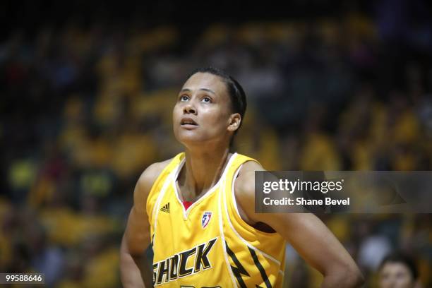 Marion Jones of the Tulsa Shock pauses to look at the scoreboard during the WNBA game between Minnesota Lynx and Tulsa Shock on May 15, 2010 at the...