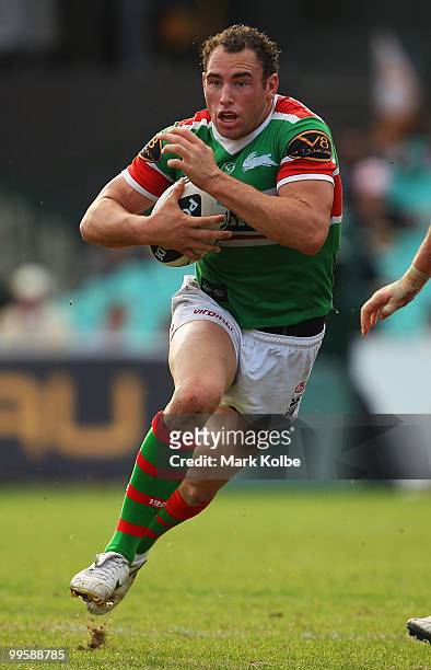 Luke Stuart of the Rabbitohs runs the ball during the round ten NRL match between the Wests Tigers and the South Sydney Rabbitohs at Sydney Cricket...